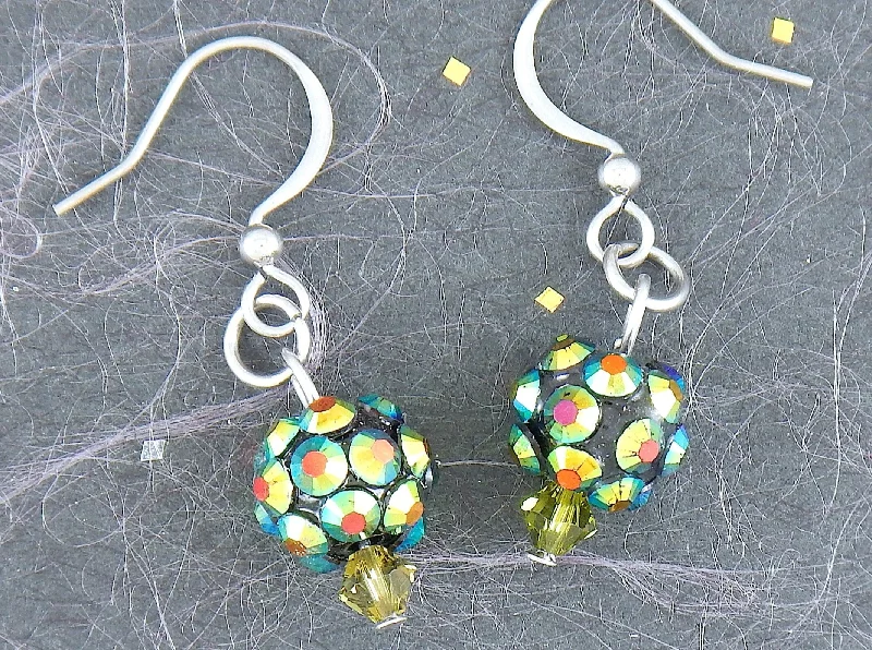 Short earrings with tiny crystal disco balls in golden green, stainless steel hooks