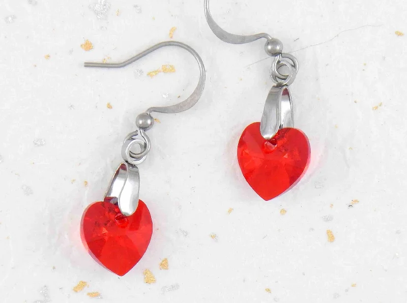 Short earrings with 10mm faceted Light Siam (bright red) Swarovski crystal hearts, stainless steel hooks