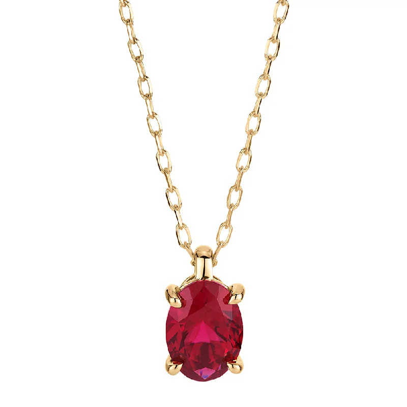 Shiny druzy necklaces-Oval solitaire pendant with ruby simulant in 10 carat yellow gold