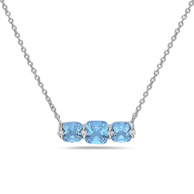 Oval gem necklaces-Blue Topaz And Diamond Halo Necklace