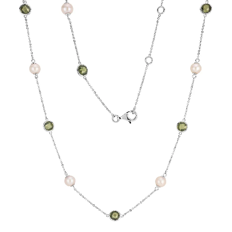 Oval drop necklaces-Cultured freshwater pearl and peridot simulant drop necklace in sterling silver