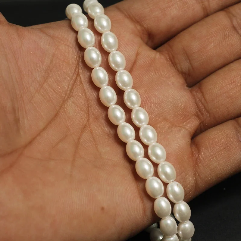 Flow shape rings-1 String, 8x6mm Shell Pearl Beads White Oval