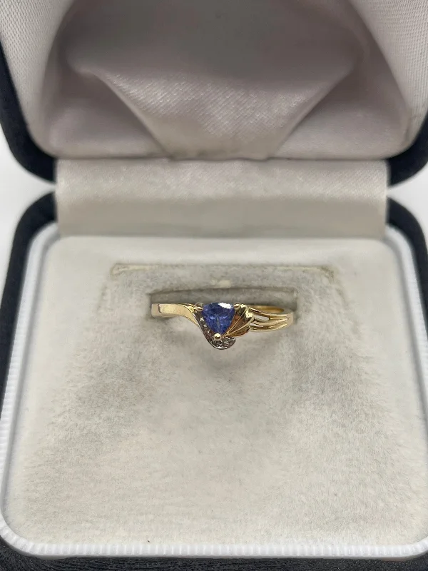 Reef knot rings-14ct gold tanzanite and diamond ring