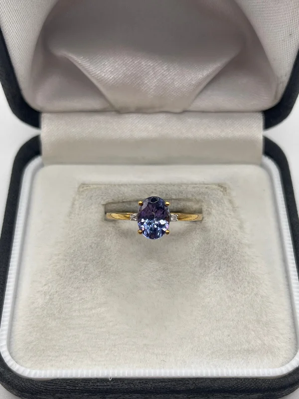 Woven motif rings-9ct gold tanzanite and diamond ring