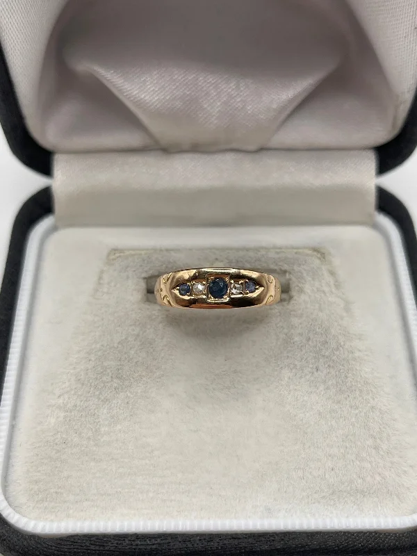 Bear motif rings-9ct rose gold sapphire and diamond ring