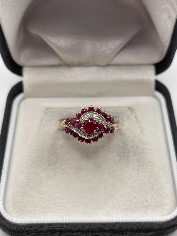 Small wing rings-9ct gold ruby and diamond ring