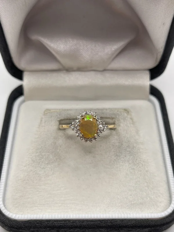 Clear star rings-9ct gold opal and zircon ring