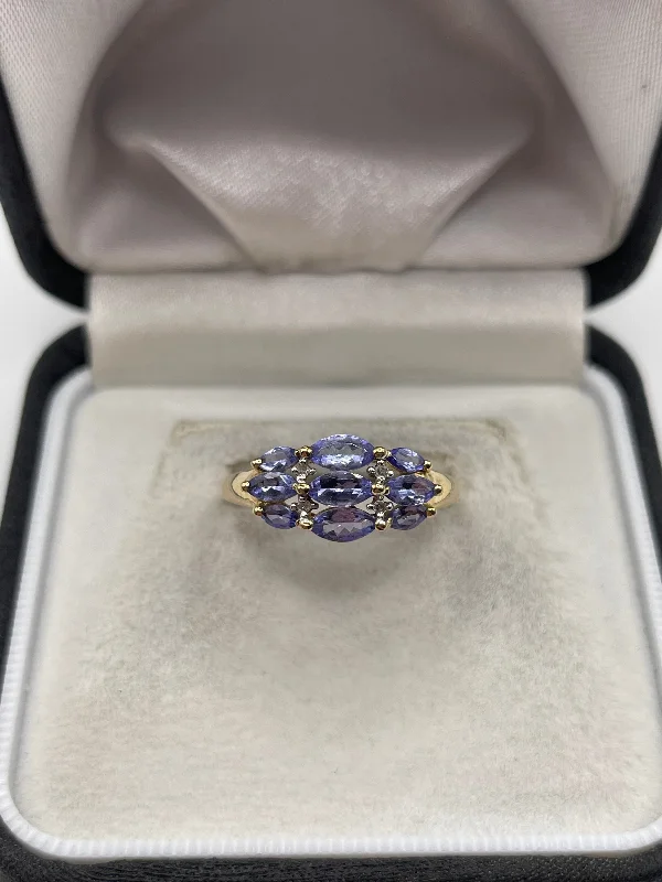 Whimsical rings-9ct gold tanzanite and diamond ring