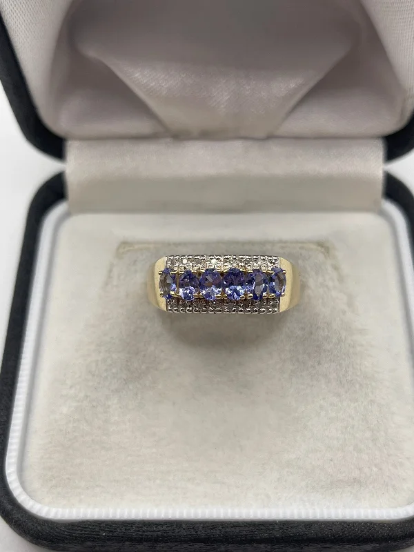 Sleek stone rings-9ct gold tanzanite and diamond ring