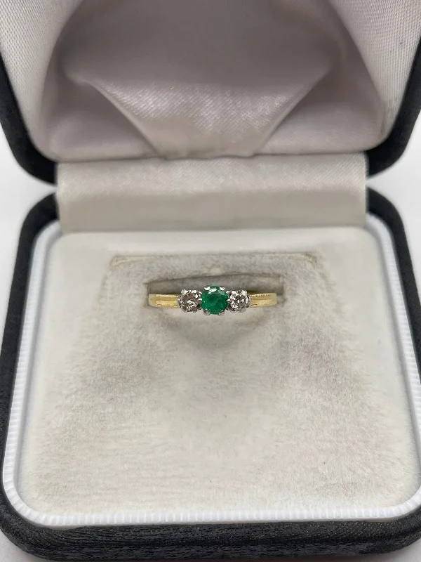 Flex open rings-18ct gold emerald and diamond ring