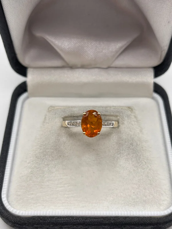 Flow style rings-9ct gold fire opal and zircon ring