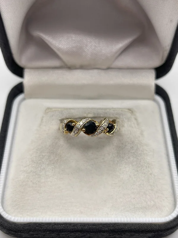 Light accent rings-9ct gold sapphire and diamond ring