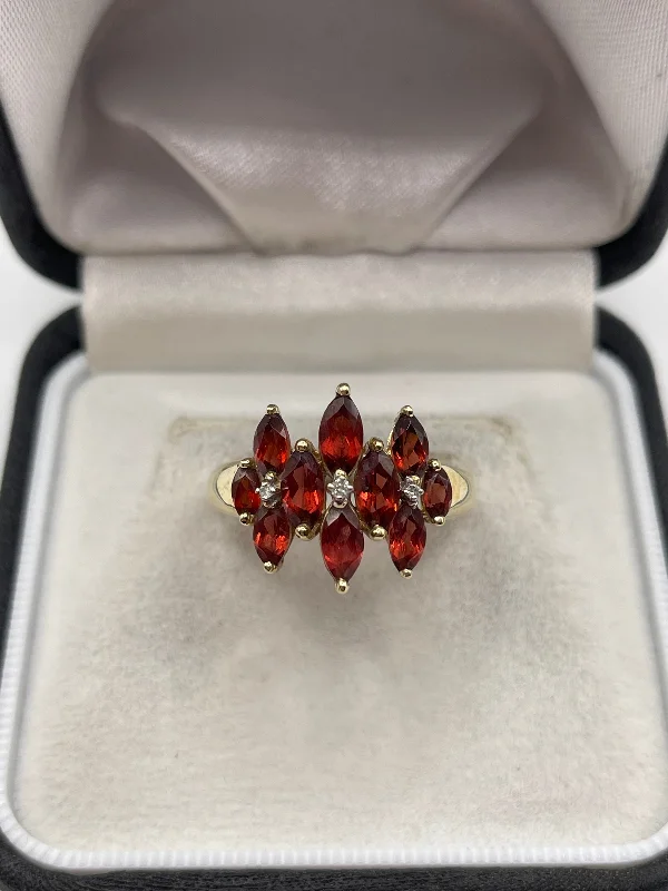 Flex open rings-9ct gold garnet and diamond ring