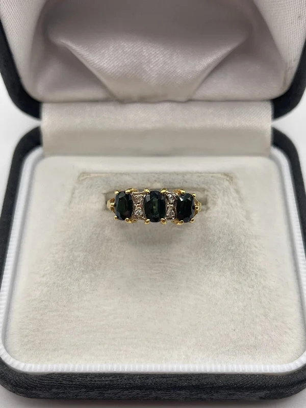 Bear motif rings-18ct gold sapphire and diamond ring