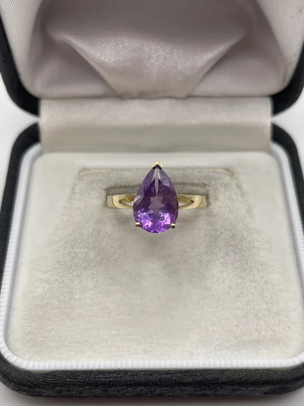 Stone pile rings-9ct gold amethyst ring