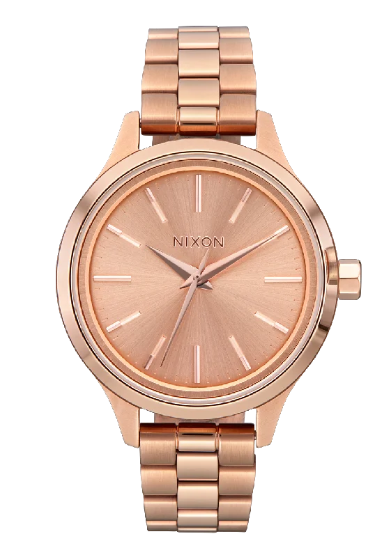 Luxe diamond watches-Nixon Optimist Stainless Steel Rose Gold Dial Womens Watch A1342-897-00